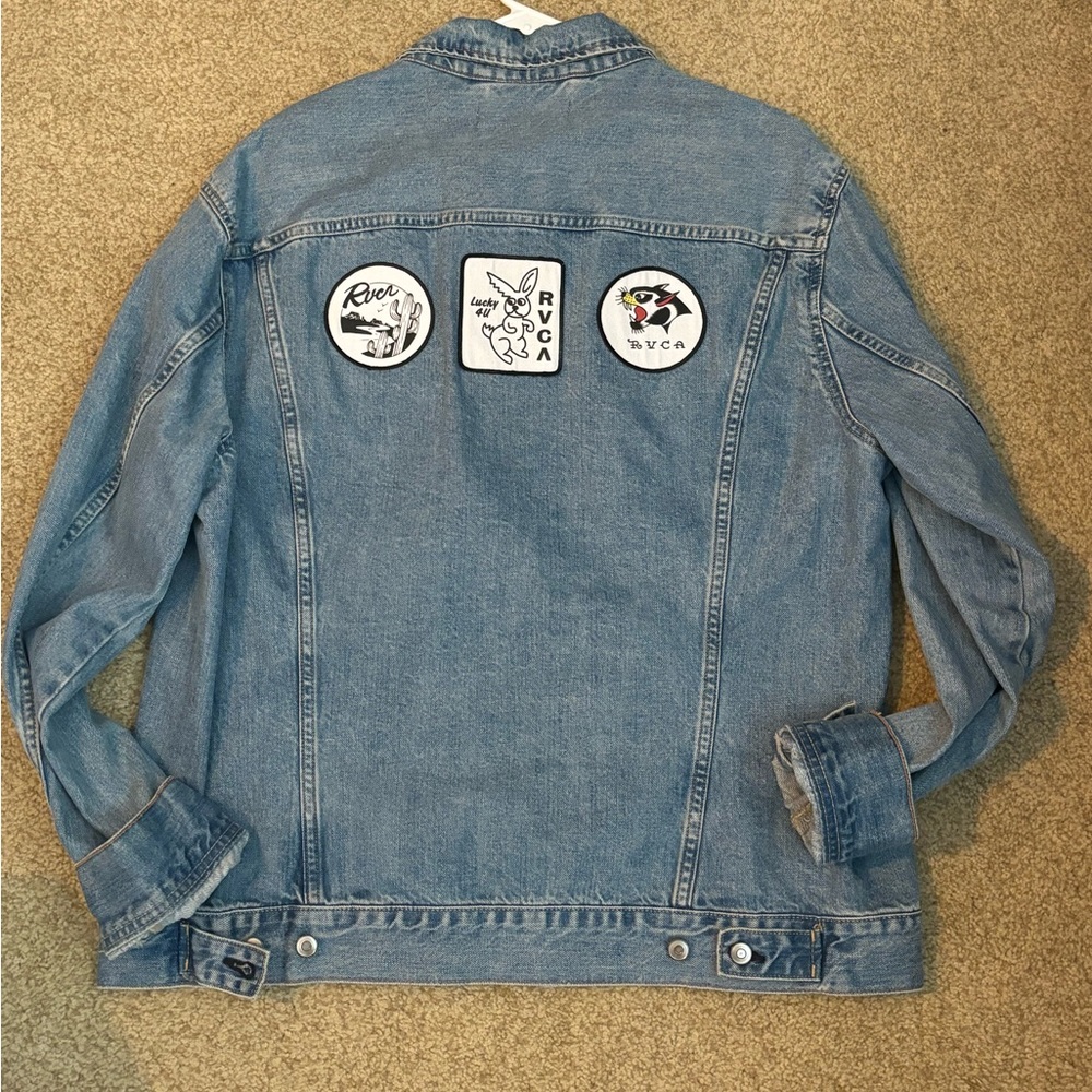 Jean jacket with (h and m) with RVCA patches on back